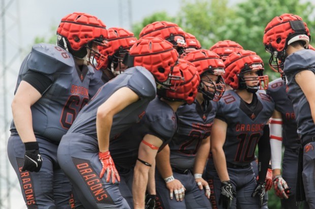 Holstebro Dragons' quarterback Matt Reyes commanding the offensive huddle (Photo courtesy of Harmony Ayala-Ruiz)