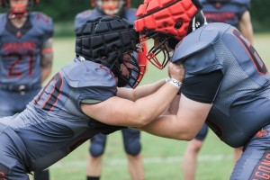 The Holstebro Dragons utilizing Guardian Caps in training (Photo courtsey of Harmony Ayala-Ruiz).