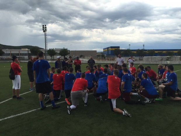Players huddle up at the conclusion of the first session.